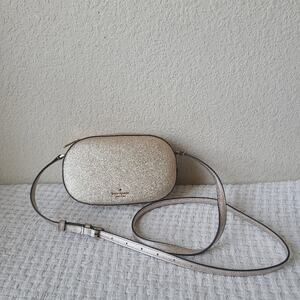 Kate Spade Gold Crossbody Bag with Minimalist Design